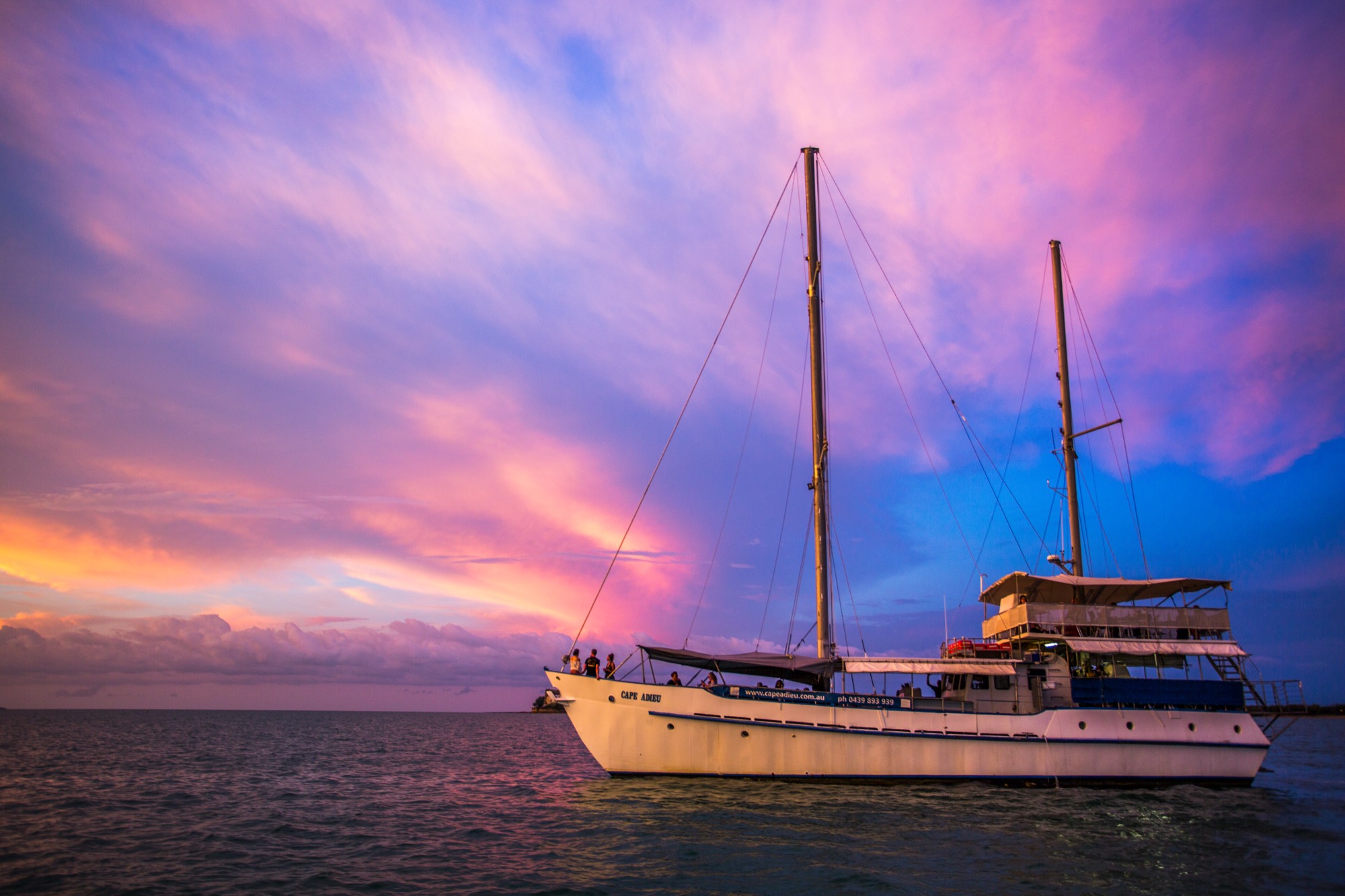 MV Cape Adieu mothership at anchor in a remote Monsoon Coast bay at sunset