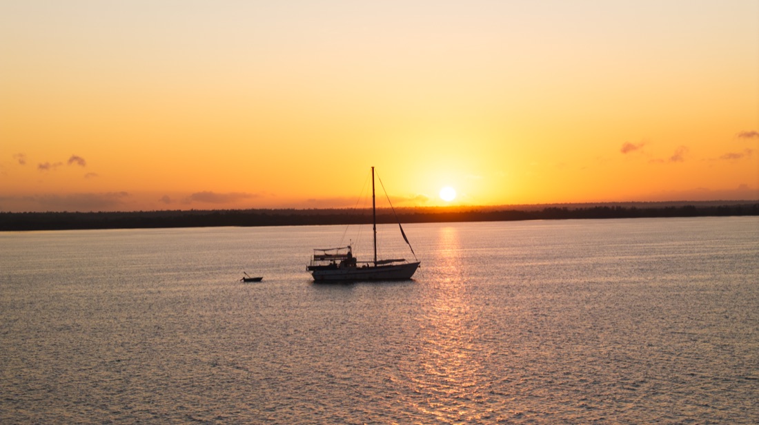 Cape Adieu at anchor against a Darwin Harbour sunset